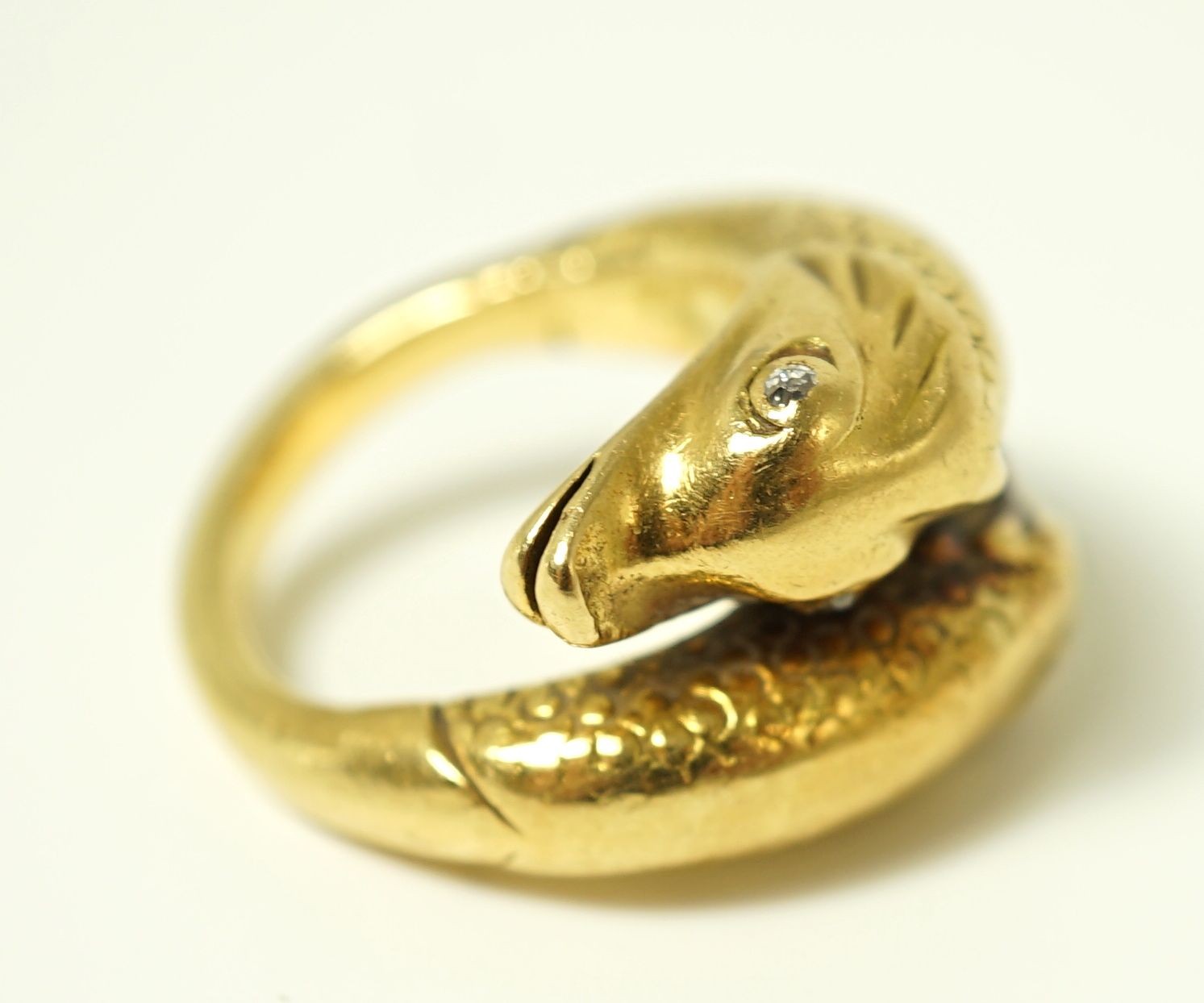 A yellow metal, sapphire an diamond set four stone dress ring, size L, gross 3.4 grams.